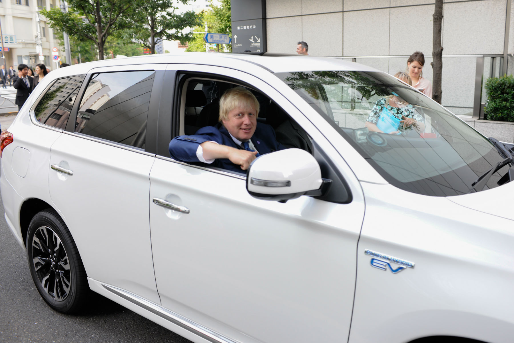 Boris Johnson takes covers off new Mitsubishi Outlander PHEV