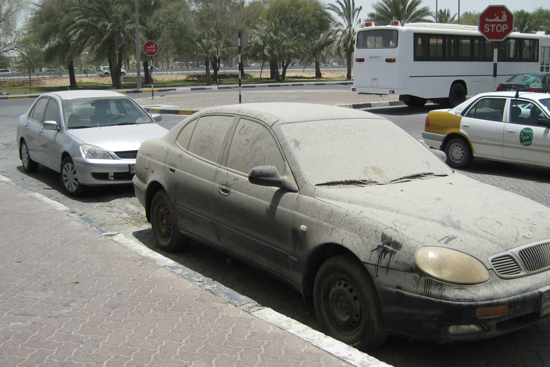 Abu Dhabi officials are towing away dirty cars because they're an eyesore