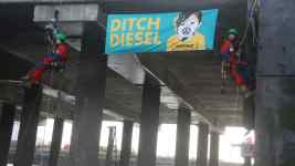 Greenpeace protesters have boarded a ship carrying diesel Volkswagens