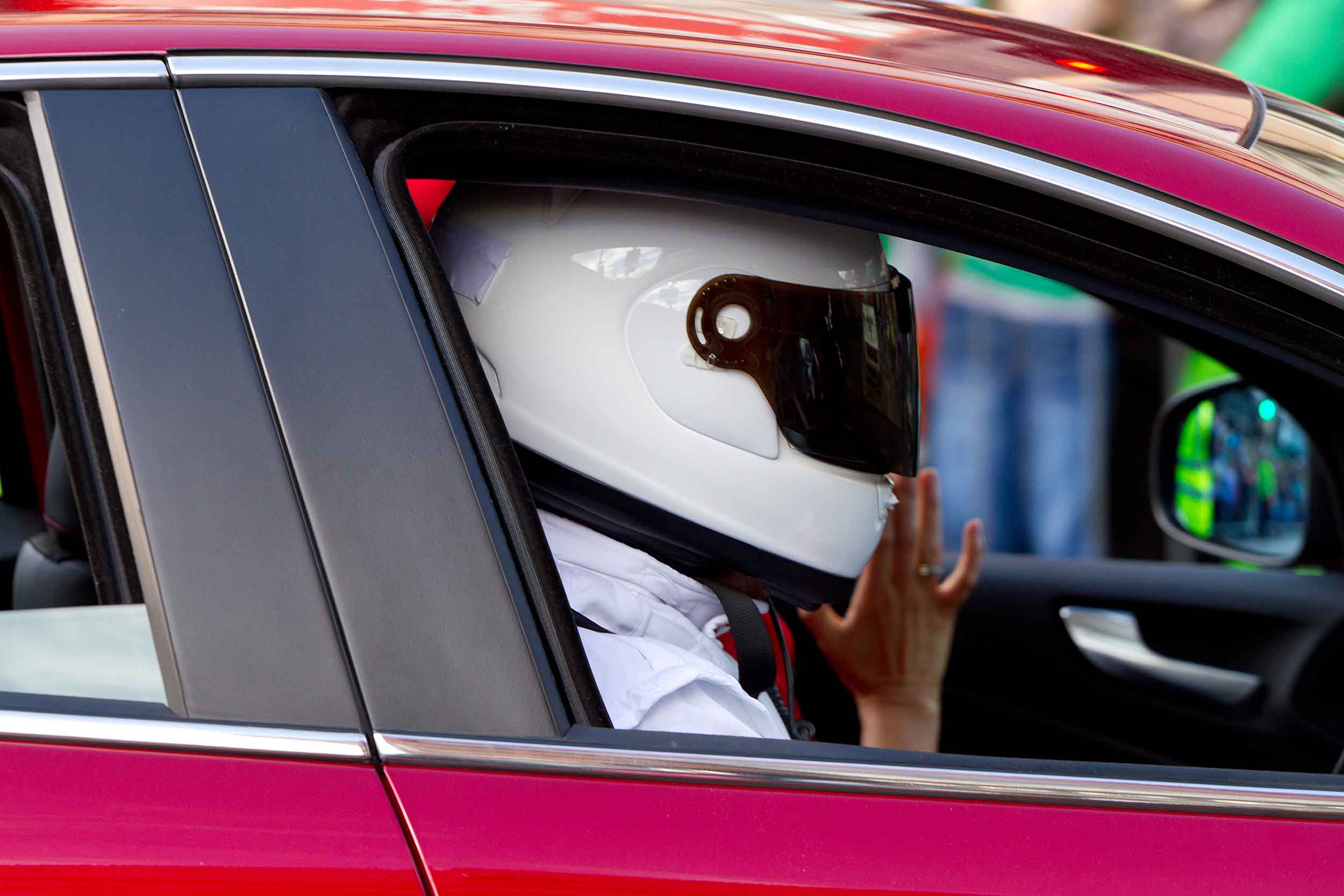 Person in traffic wearing a helmet