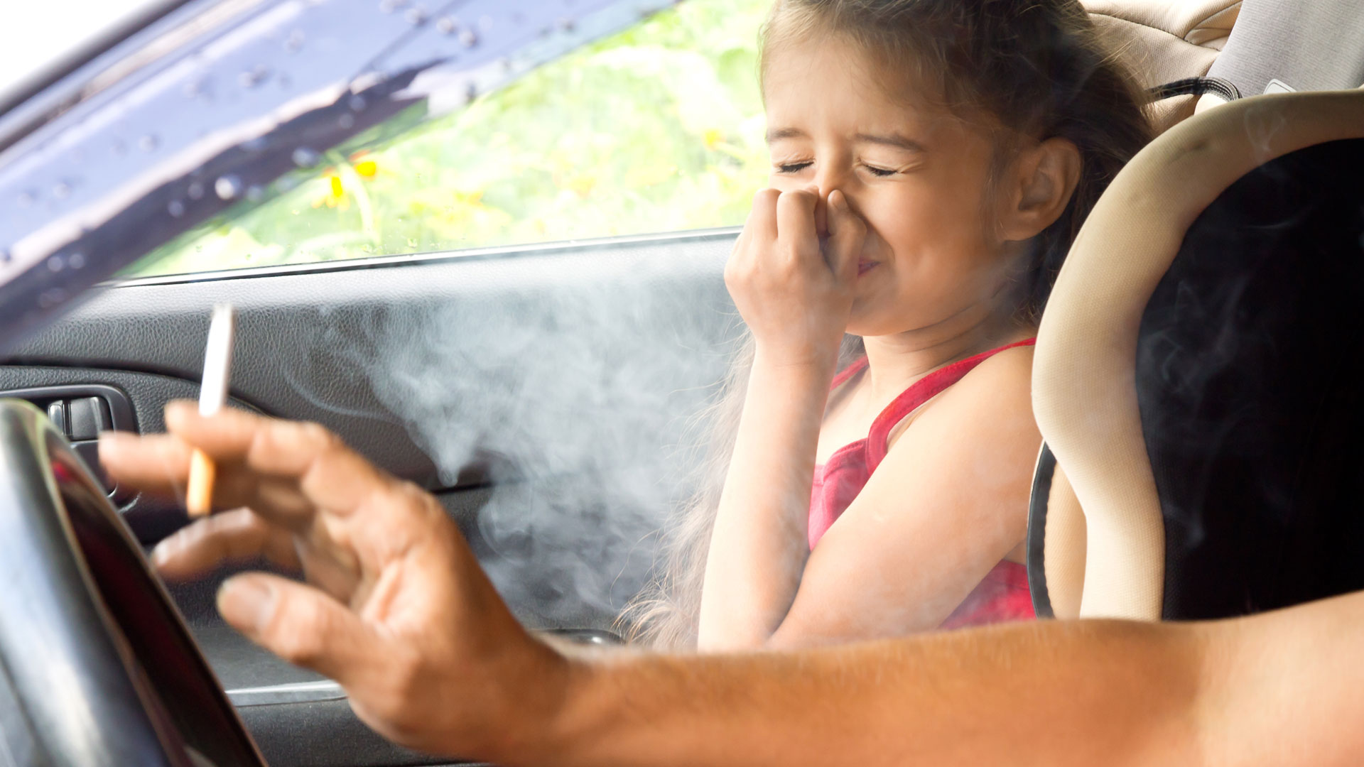 smoking in a car with a child