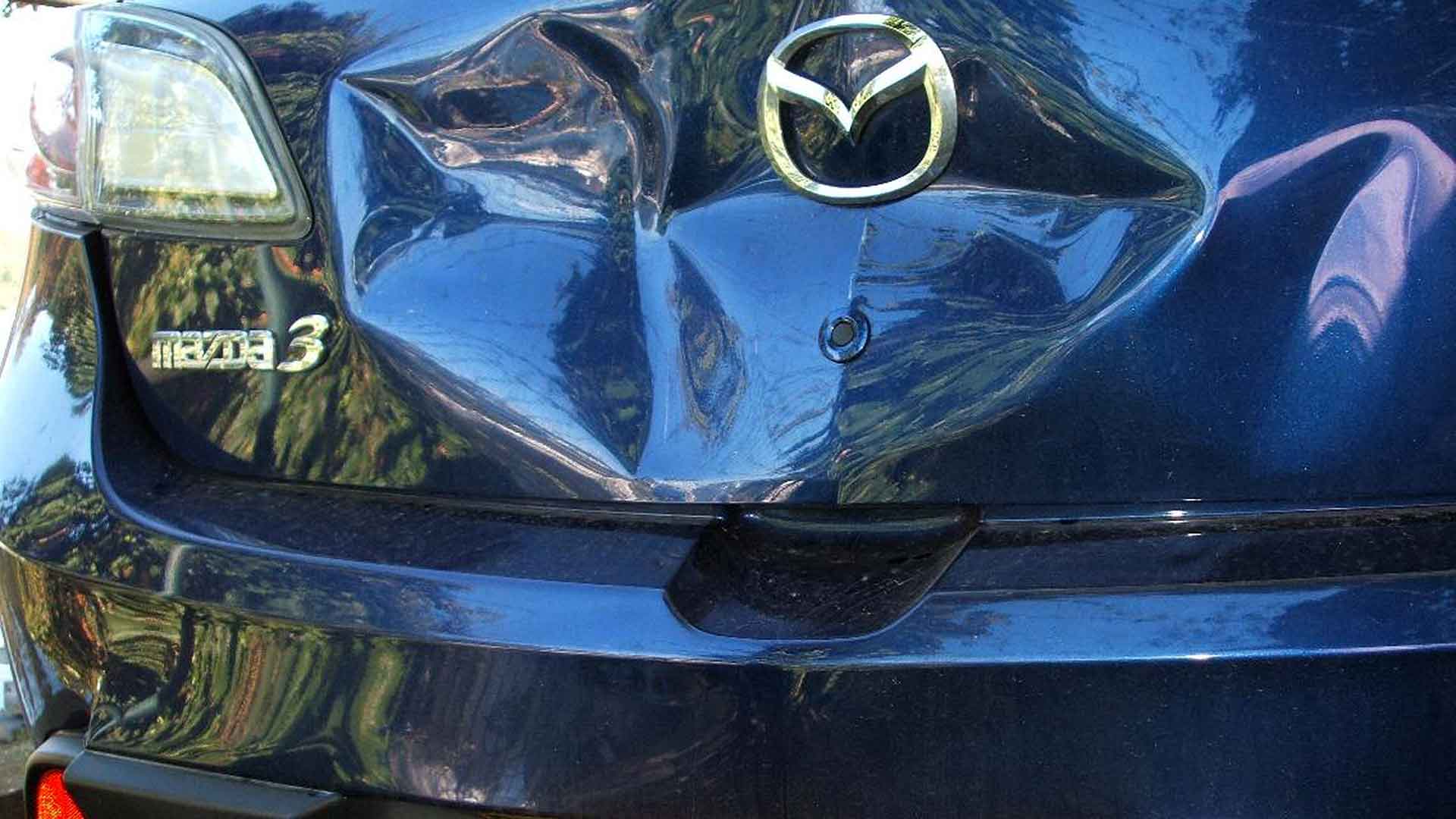 Car bootlid damaged in an accident