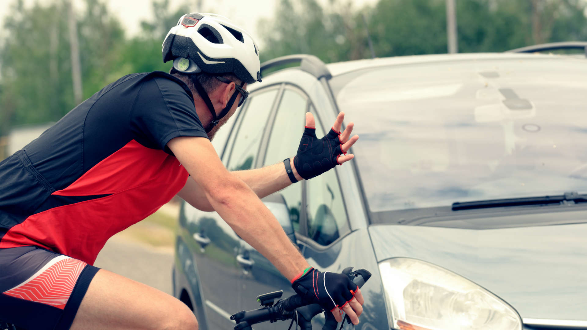 Cyclist arguing with a driver