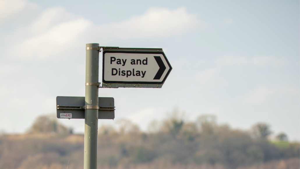 Pay and display parking sign