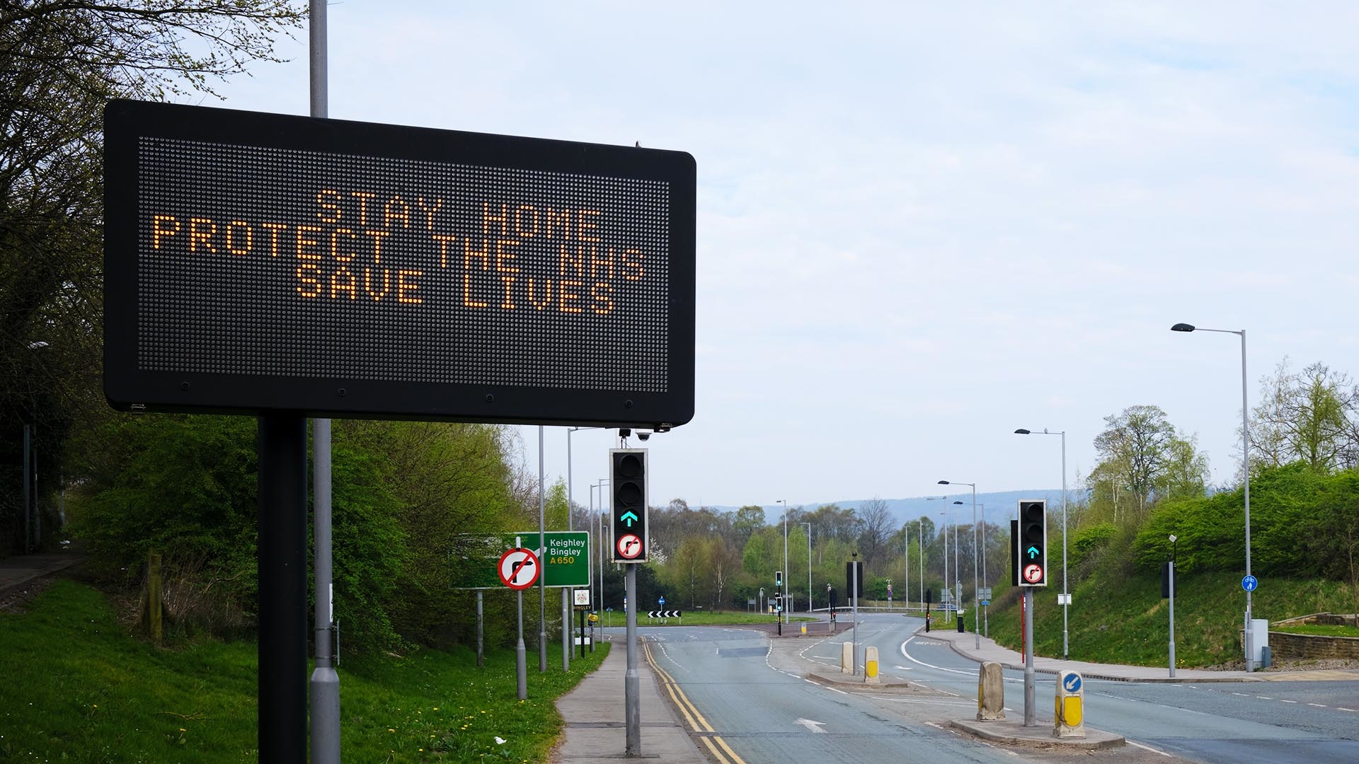 Stay home road sign UK