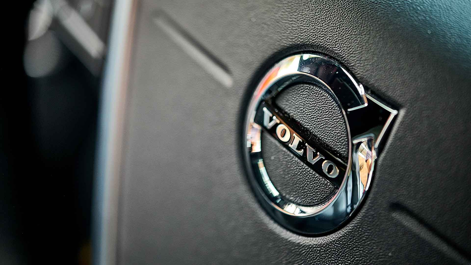 Volvo steering wheel logo: the automaker is now electronically limiting all its cars to a 112mph top speed