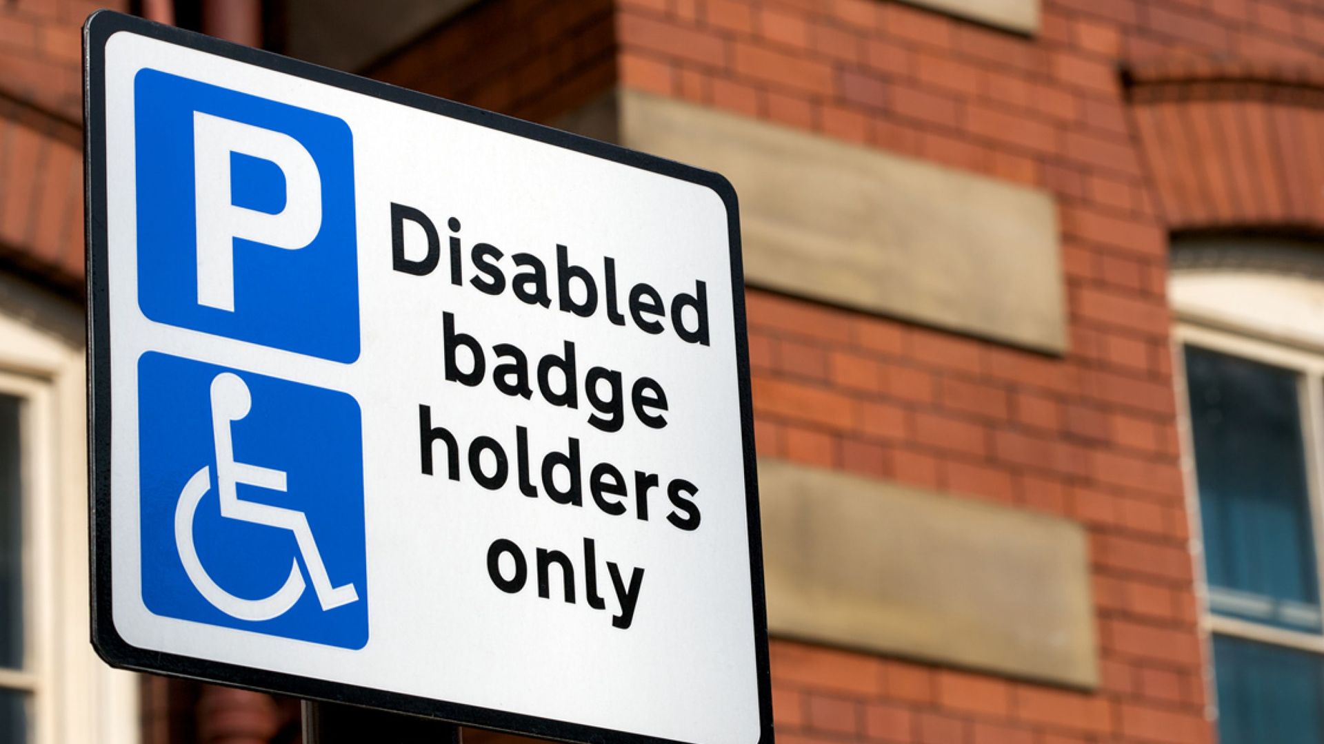 Disabled badge holders only sign
