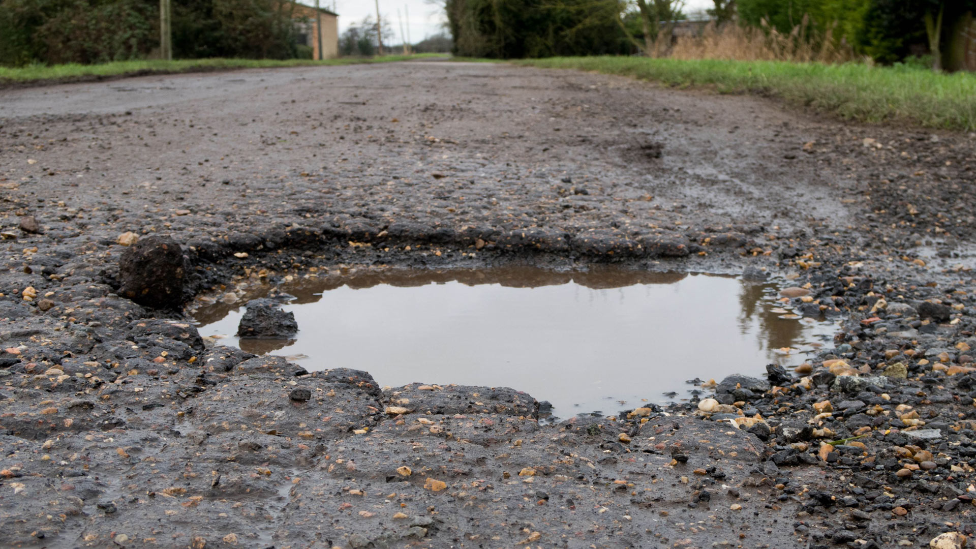 The government has allocated £7.3 billion in long-term funding for local authorities to tackle a national pothole pandemic
