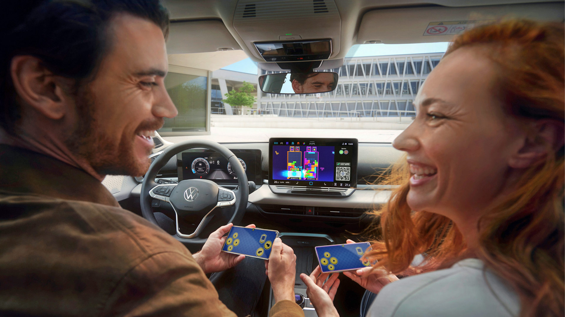 The AirConsole system sees players use their smartphone to play in-car games, without the need for any extra hardware