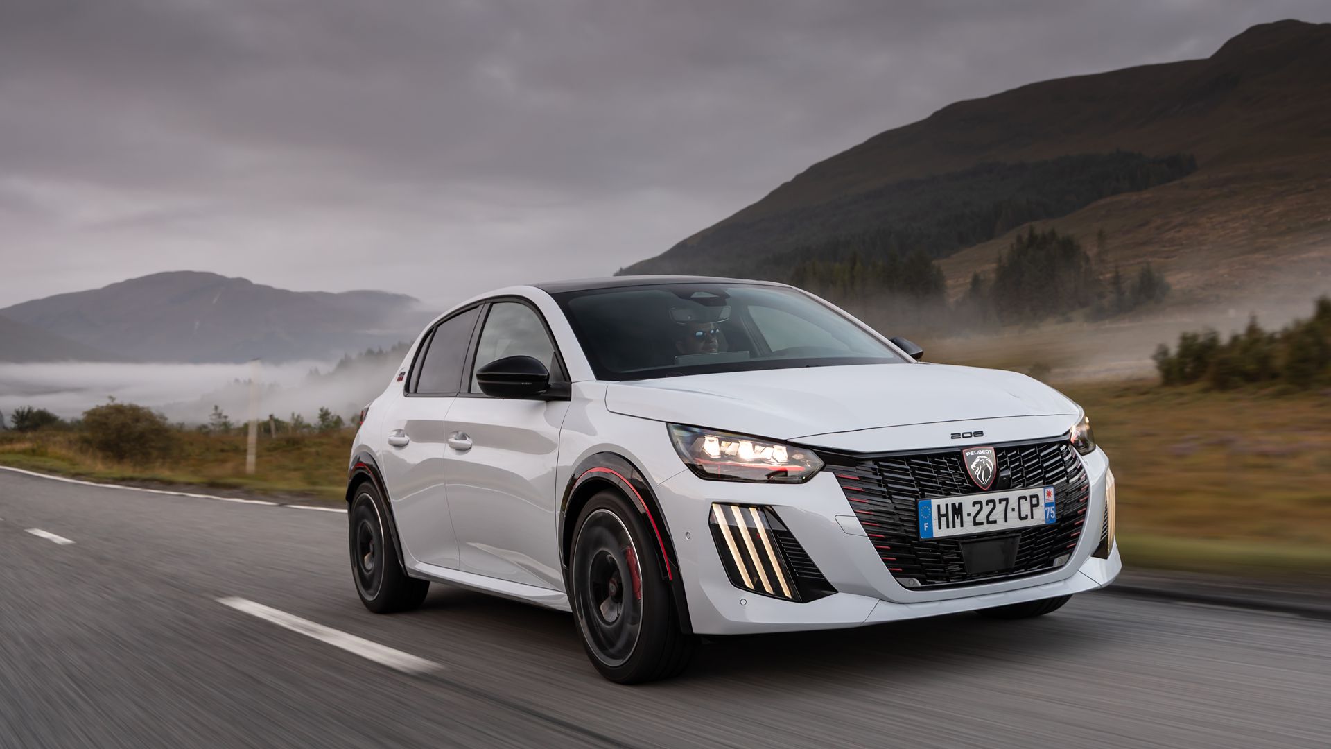 Tim Pitt drives the new electric Peugeot E-208 GTI hot hatch. Can it rekindle the spirit of the classic 205 GTI?